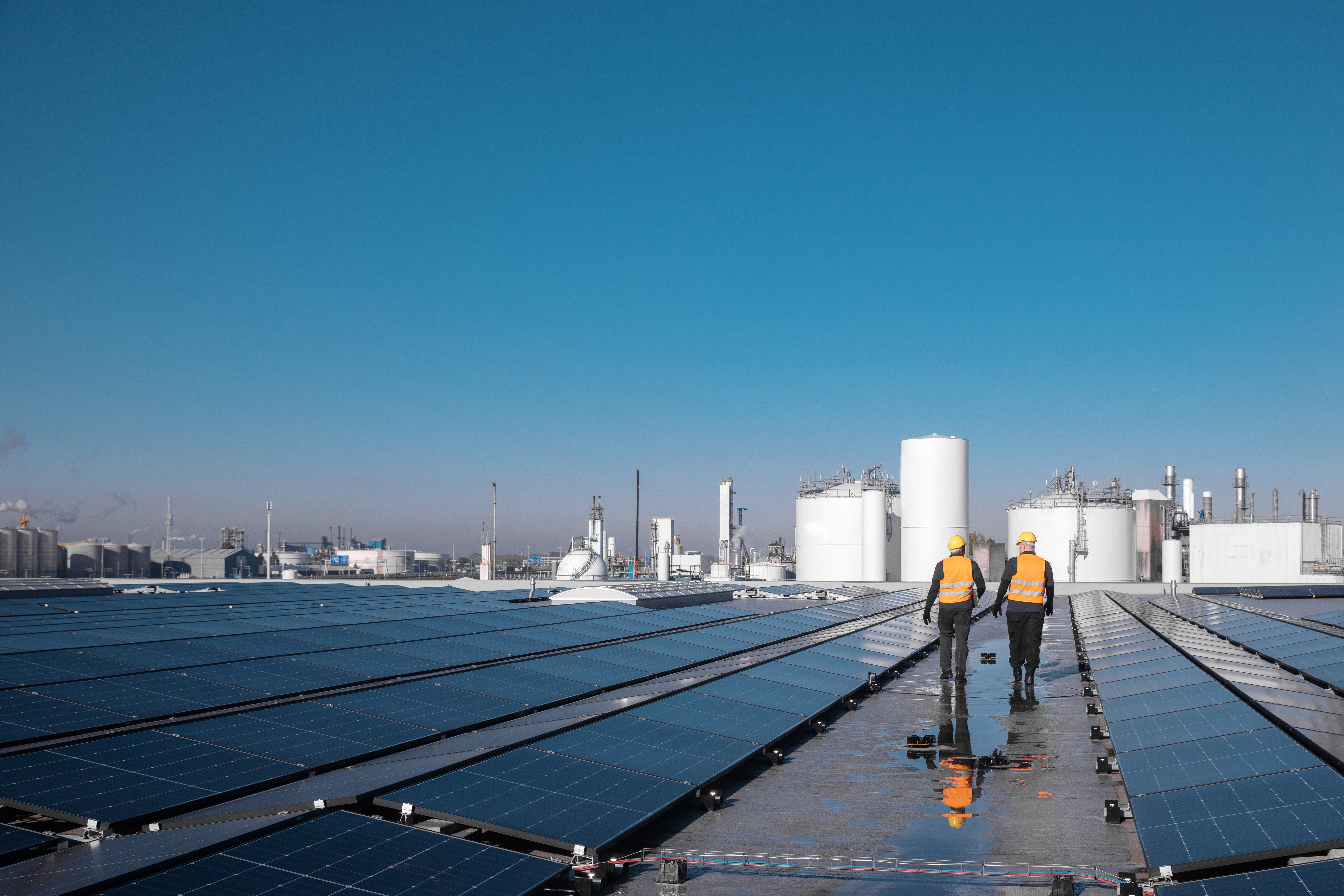 Two workers on a solar plant